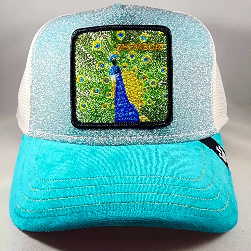 Goorin Bros The Farm Showboat at the Copa Peacock Showboat Capsule Trucker Hat